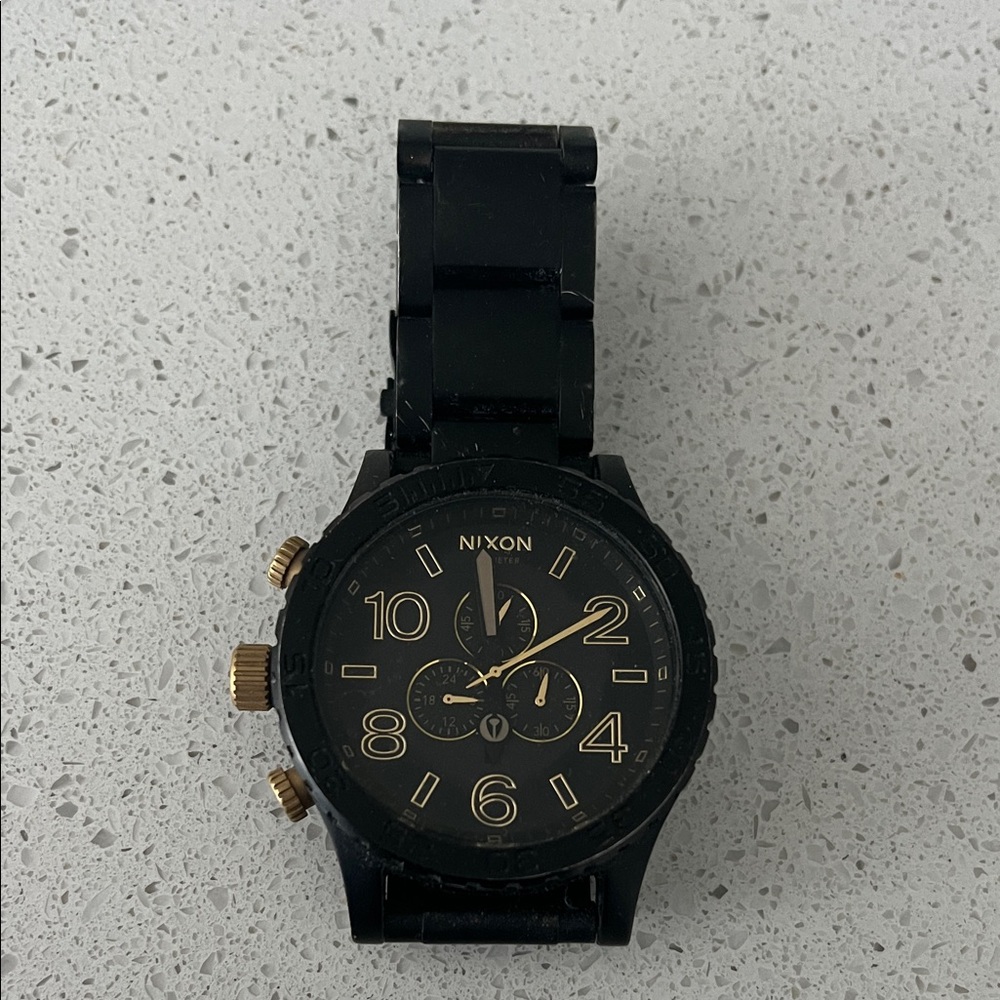 Nixon Men's Watch in Black with Gold Details